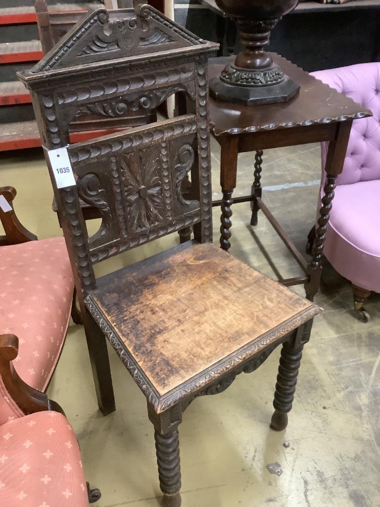 A Victorian Aesthetic movement carved oak hall seat, another carved oak chair, a tile top occasional table and a rectangular occasional table